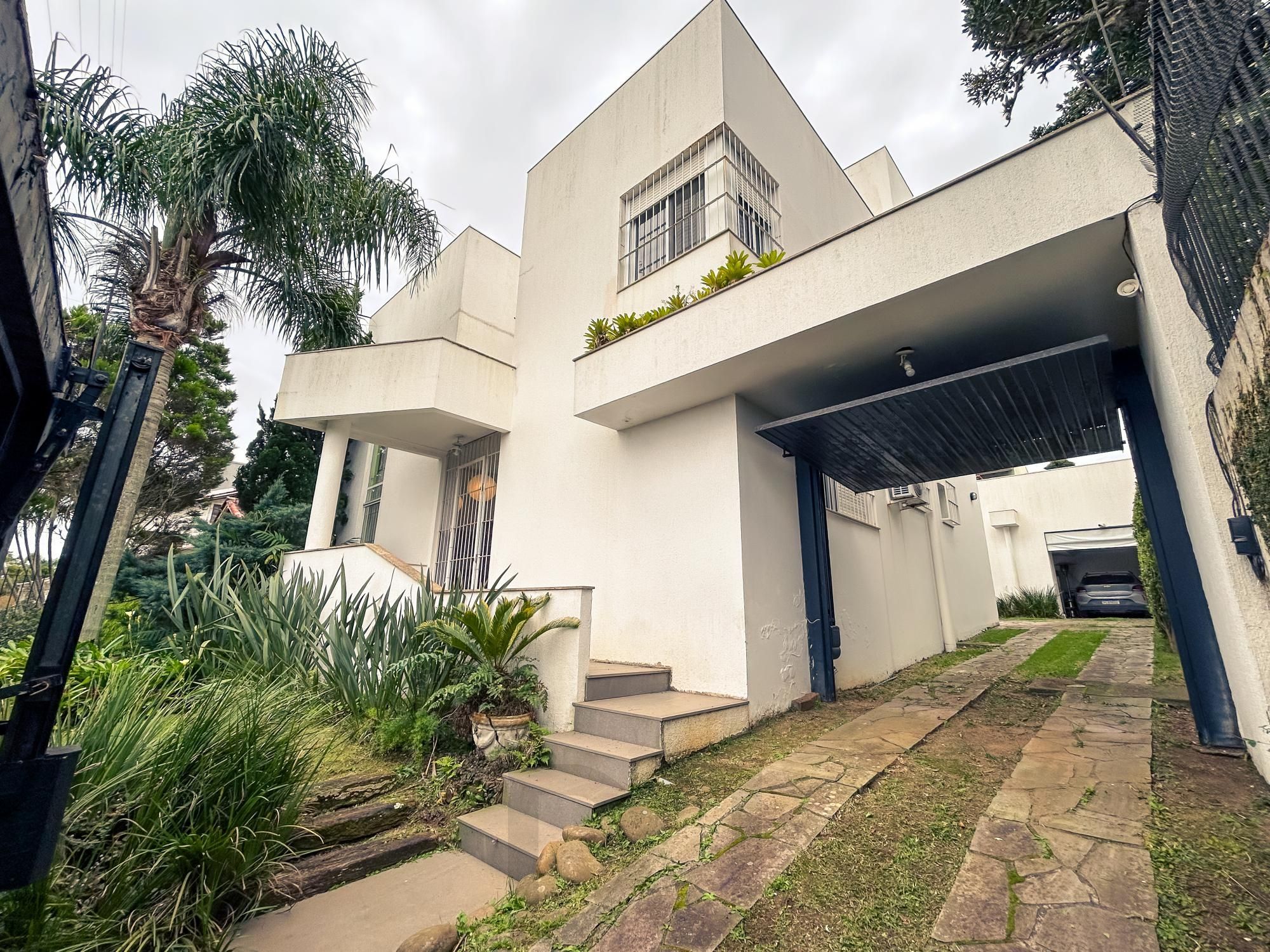 Casa em Porto Alegre, no bairro Espírito Santo, com 3 dormitório(s), e 3 banheiros, à venda. — foto 1