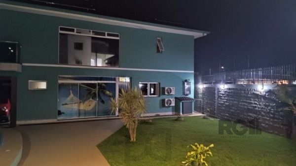 Casa em Porto Alegre, no bairro Hípica, com 3 dormitório(s), e 3 banheiros, à venda. — foto 26