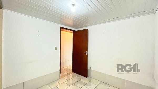 Casa em Porto Alegre, no bairro Guarujá, com 2 dormitório(s), e 2 banheiros, à venda. — foto 25