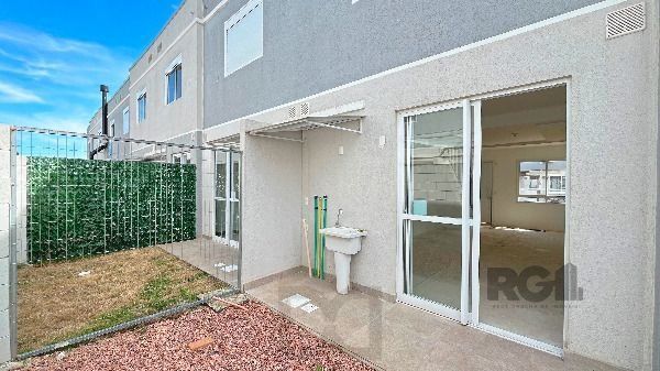 Casa em Porto Alegre, no bairro Vila Nova, com 2 dormitório(s), e 2 banheiros, à venda. — foto 14