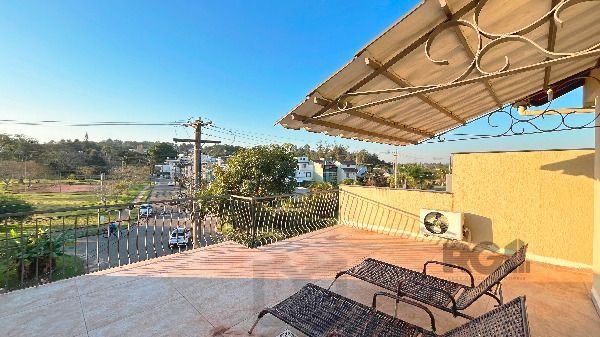 Casa em Porto Alegre, no bairro Hípica, com 3 dormitório(s), e 3 banheiros, à venda. — foto 48
