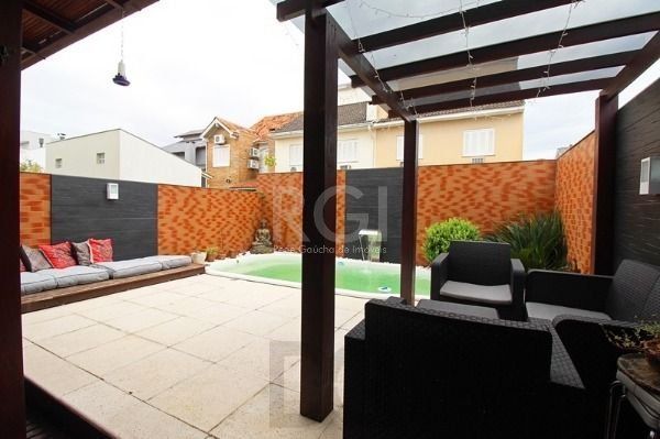 Casa em Porto Alegre, no bairro Hípica, com 3 dormitório(s), e 3 banheiros, à venda. — foto 20