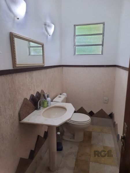 Casa em Porto Alegre, no bairro Vila Nova, com 4 dormitório(s), e 4 banheiros, à venda. — foto 9