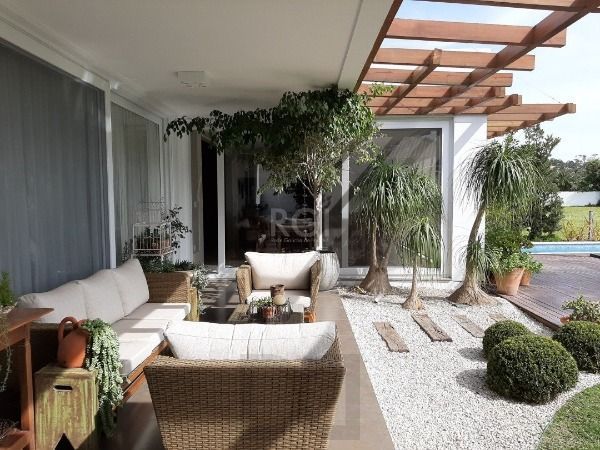 Casa Condominio em Porto Alegre, no bairro Belém Novo, com 3 dormitório(s), e 3 banheiros, à venda. — foto 9