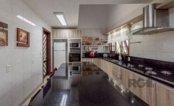 Casa em Porto Alegre, no bairro Aberta dos Morros, com 4 dormitório(s), e 4 banheiros, à venda. — foto 12
