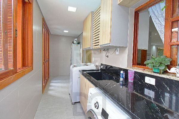 Casa em Porto Alegre, no bairro Hípica, com 3 dormitório(s), e 3 banheiros, à venda. — foto 20