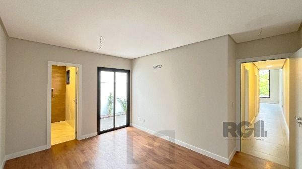 Casa em Porto Alegre, no bairro Hípica, com 3 dormitório(s), e 3 banheiros, à venda. — foto 14