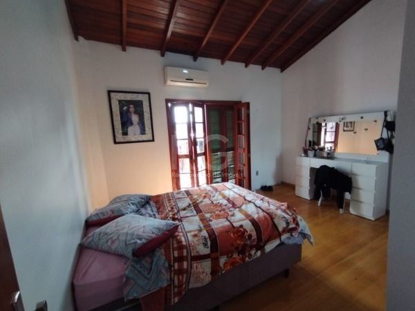 Casa em Porto Alegre, no bairro Hípica, com 3 dormitório(s), e 3 banheiros, à venda. — foto 19