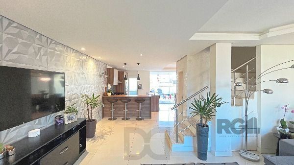 Casa em Porto Alegre, no bairro Hípica, com 3 dormitório(s), e 3 banheiros, à venda. — foto 8