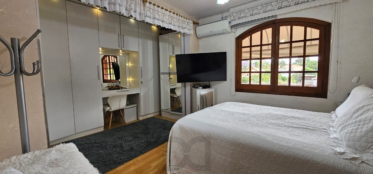 Casa em Condominio Horizontal com 3 dormitórios sendo 1 suíte com 1 vaga coberta — foto 12