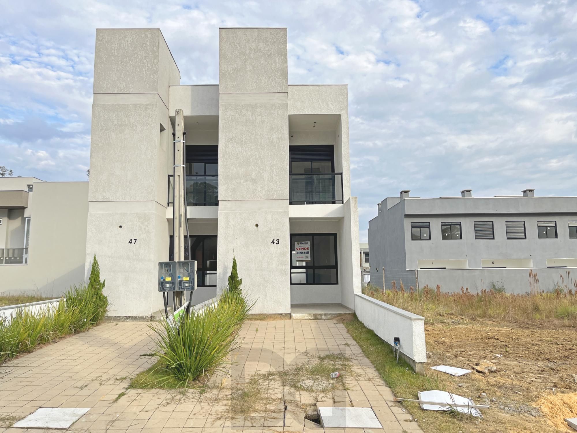 Casa em Porto Alegre, no bairro Hípica, com 2 dormitório(s), e 2 banheiros, à venda. — foto 1