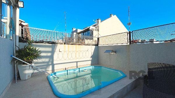 Casa em Porto Alegre, no bairro Hípica, com 3 dormitório(s), e 3 banheiros, à venda. — foto 23