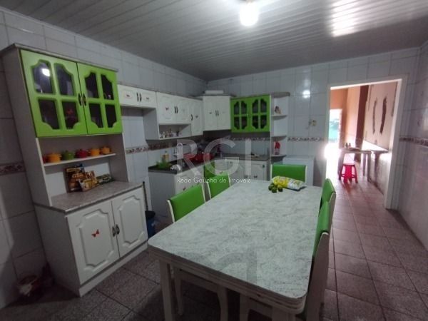 Casa em Porto Alegre, no bairro Belém Novo, com 5 dormitório(s), e 5 banheiros, à venda. — foto 27