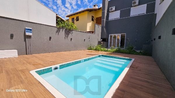 Casa em Porto Alegre, no bairro Hipica, com 3 dormitório(s), e 3 banheiros, à venda. — foto 6