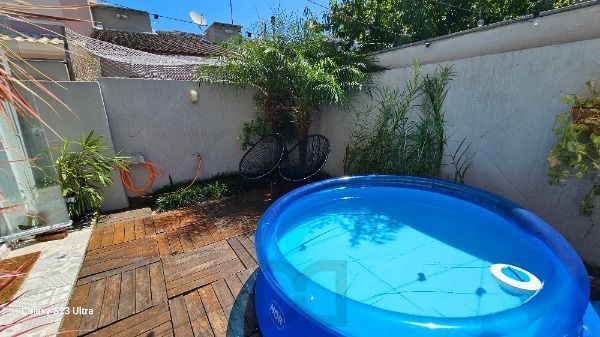 Casa em Porto Alegre, no bairro Hípica, com 3 dormitório(s), e 3 banheiros, à venda. — foto 5