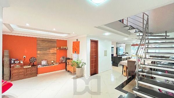 Casa em Porto Alegre, no bairro Hípica, com 3 dormitório(s), e 3 banheiros, à venda. — foto 8