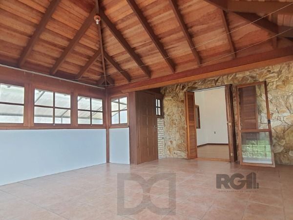 Casa em Porto Alegre, no bairro Vila Nova, com 4 dormitório(s), e 4 banheiros, à venda. — foto 16