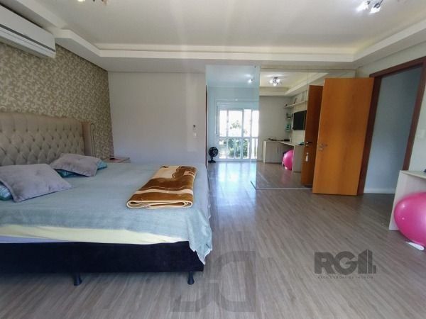 Casa em Porto Alegre, no bairro Hípica, com 3 dormitório(s), e 3 banheiros, à venda. — foto 11