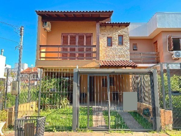 Casa em Porto Alegre, no bairro Hípica, com 3 dormitório(s), e 3 banheiros, à venda. — foto 2