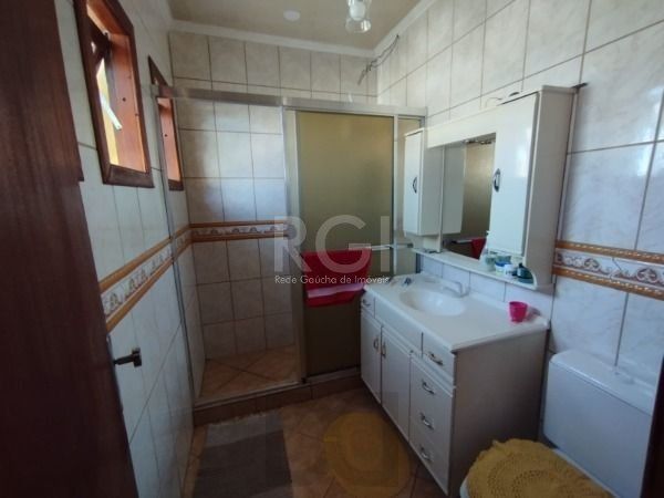 Casa em Porto Alegre, no bairro Hípica, com 3 dormitório(s), e 3 banheiros, à venda. — foto 27