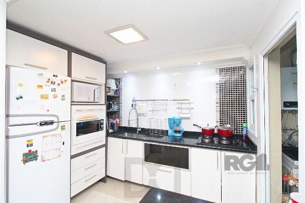 Casa em Porto Alegre, no bairro Hípica, com 3 dormitório(s), e 3 banheiros, à venda. — foto 20