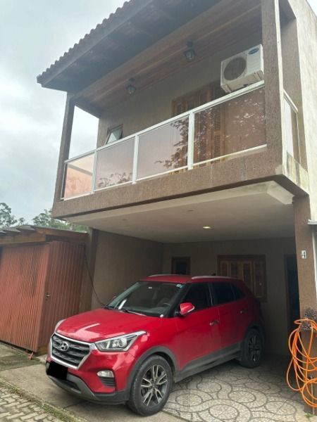 Casa Condominio em Porto Alegre, no bairro Ponta Grossa, com 3 dormitório(s), e 3 banheiros, à venda. — foto 1
