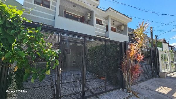 Casa em Porto Alegre, no bairro Hípica, com 3 dormitório(s), e 3 banheiros, à venda. — foto 32