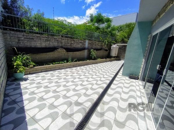 Casa em Porto Alegre, no bairro Hípica, com 3 dormitório(s), e 3 banheiros, à venda. — foto 21