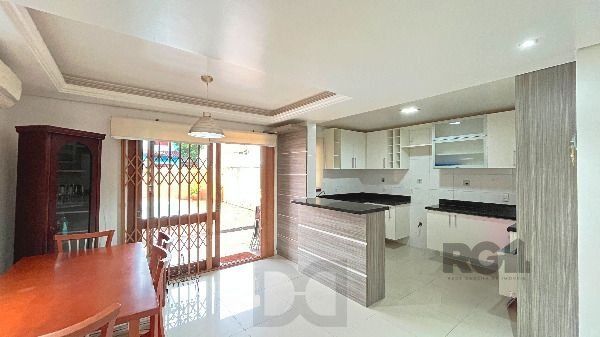 Casa em Porto Alegre, no bairro Hípica, com 3 dormitório(s), e 3 banheiros, à venda. — foto 14