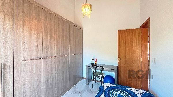 Casa em Porto Alegre, no bairro Hípica, com 3 dormitório(s), e 2 banheiros, à venda. — foto 31