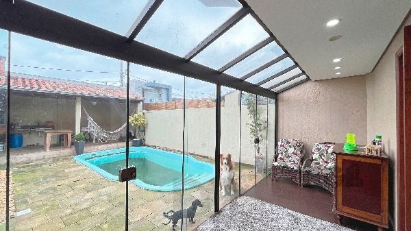 Casa em Porto Alegre, no bairro Hípica, com 3 dormitório(s), e 3 banheiros, à venda. — foto 21