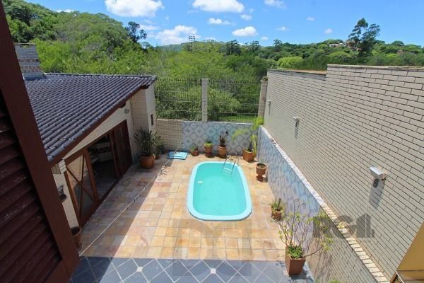 Casa em Porto Alegre, no bairro Ipanema, com 3 dormitório(s), e 3 banheiros, à venda. — foto 53