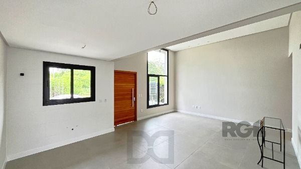 Casa em Porto Alegre, no bairro Hípica, com 3 dormitório(s), e 3 banheiros, à venda. — foto 5