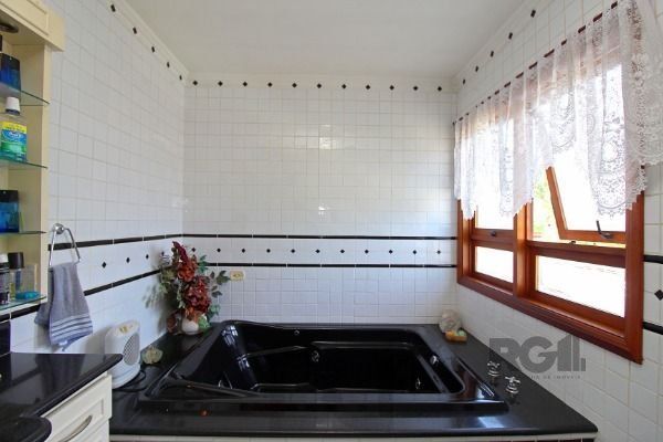Casa em Porto Alegre, no bairro Ipanema, com 3 dormitório(s), e 3 banheiros, à venda. — foto 51