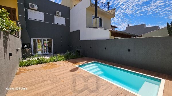 Casa em Porto Alegre, no bairro Hipica, com 3 dormitório(s), e 3 banheiros, à venda. — foto 7