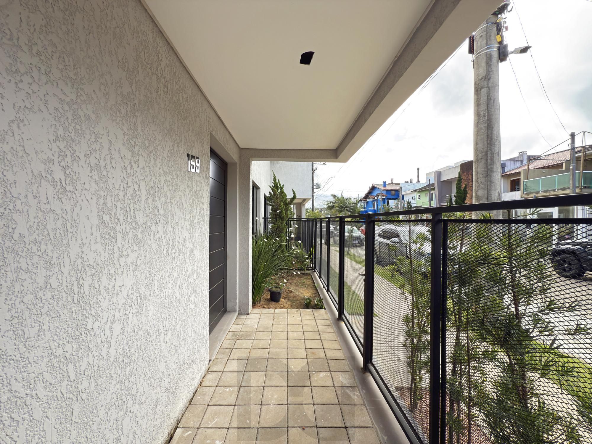 Casa em Porto Alegre, no bairro Hípica, com 4 dormitório(s), à venda. — foto 3
