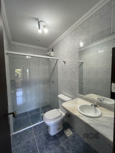 Casa em Porto Alegre, no bairro Hípica, com 3 dormitório(s), e 3 banheiros, à venda. — foto 11