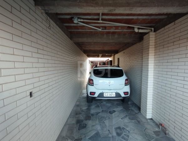 Casa em Porto Alegre, no bairro Hípica, com 3 dormitório(s), e 3 banheiros, à venda. — foto 4