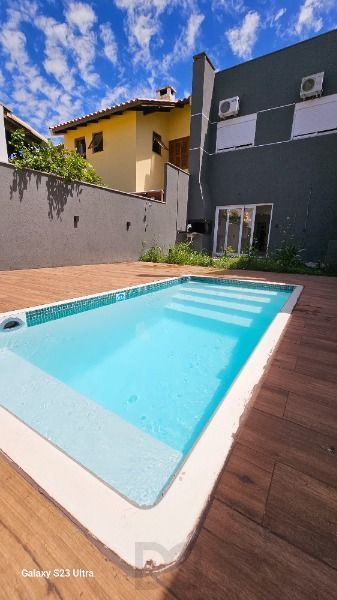 Casa em Porto Alegre, no bairro Hipica, com 3 dormitório(s), e 3 banheiros, à venda. — foto 9