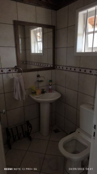 Casa em Porto Alegre, no bairro Hípica, com 3 dormitório(s), e 3 banheiros, à venda. — foto 15