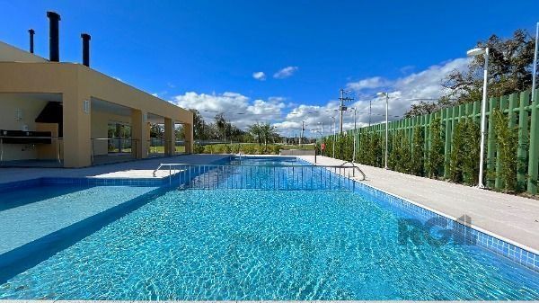Casa Condominio em Porto Alegre, no bairro Hípica, com 3 dormitório(s), e 3 banheiros, à venda. — foto 45