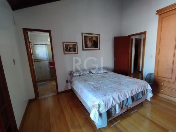 Casa em Porto Alegre, no bairro Hípica, com 3 dormitório(s), e 3 banheiros, à venda. — foto 24