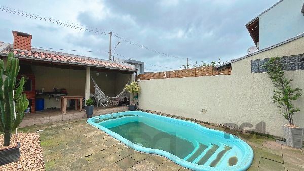 Casa em Porto Alegre, no bairro Hípica, com 3 dormitório(s), e 3 banheiros, à venda. — foto 23
