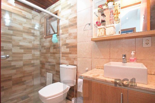 Casa em Porto Alegre, no bairro Hípica, com 3 dormitório(s), e 2 banheiros, à venda. — foto 21