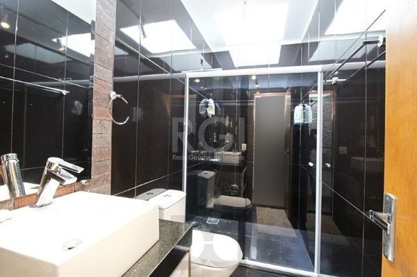 Casa em Porto Alegre, no bairro Hípica, com 3 dormitório(s), e 3 banheiros, à venda. — foto 34