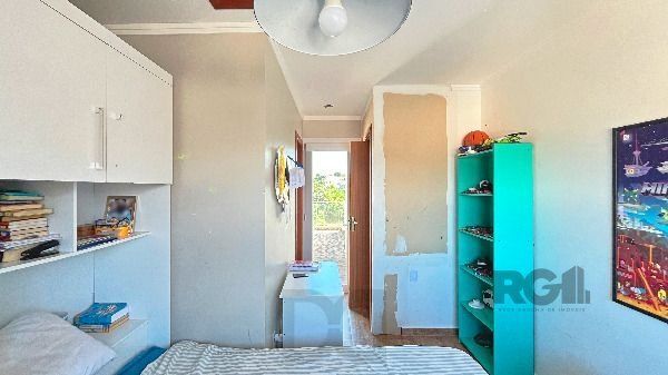 Casa em Porto Alegre, no bairro Guarujá, com 3 dormitório(s), e 3 banheiros, à venda. — foto 29