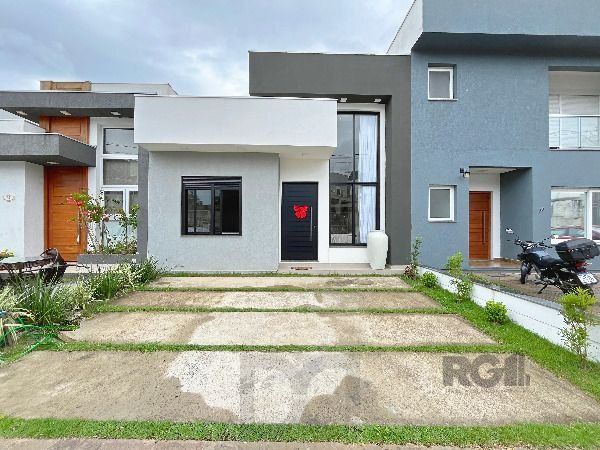 Casa Condominio em Porto Alegre, no bairro Hípica, com 3 dormitório(s), à venda. — foto 1