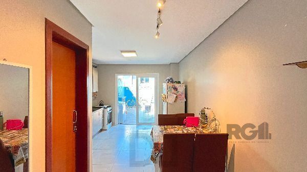 Casa em Porto Alegre, no bairro Guarujá, com 3 dormitório(s), e 3 banheiros, à venda. — foto 10
