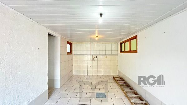 Casa em Porto Alegre, no bairro Guarujá, com 2 dormitório(s), e 2 banheiros, à venda. — foto 21
