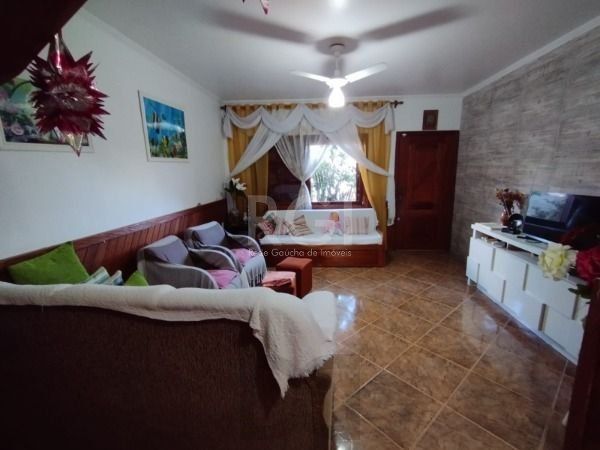 Casa em Porto Alegre, no bairro Hípica, com 3 dormitório(s), e 3 banheiros, à venda. — foto 6